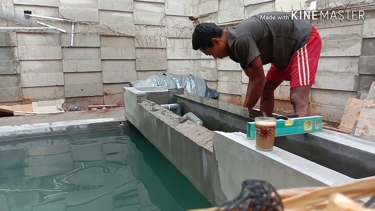 Proses pemasangan kaca grojogan dan pengetesan #tukangkolam#kolamkoi