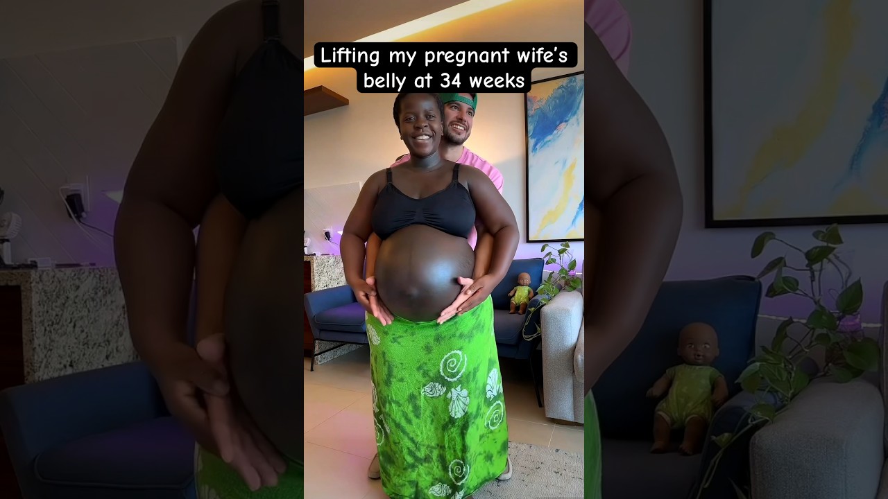 Lifting my pregnant wife&rsquo;s belly at 8 months&hellip; #shorts