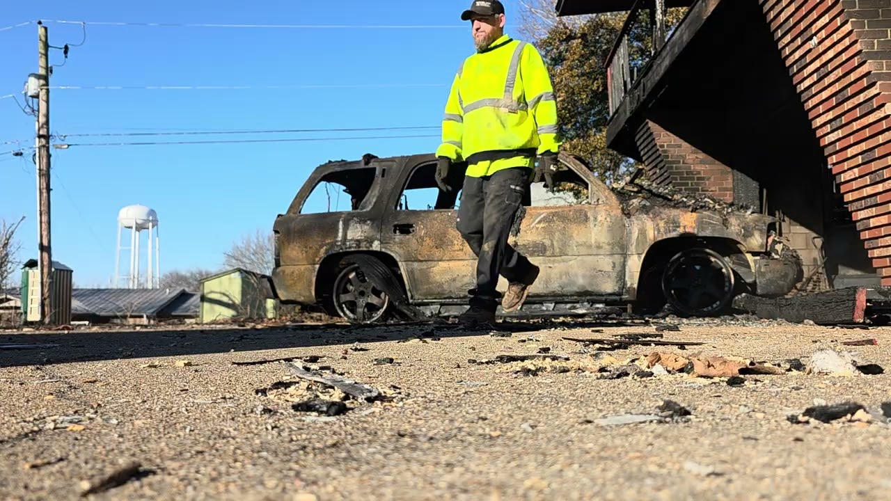 Recovery of a Tahoe from a house fire. Building collapsed on top.