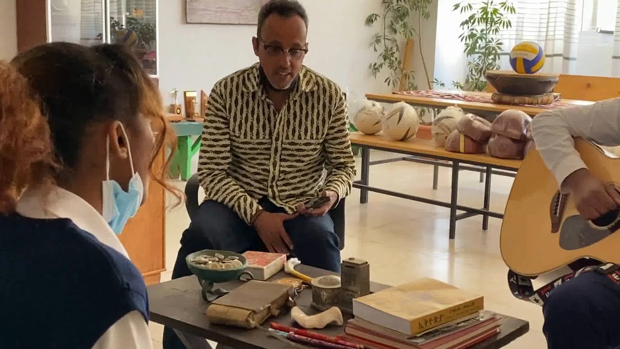 Prof. Panos, head of school at Lebawi and students rehearsing the Swahili African hit song Malaika.