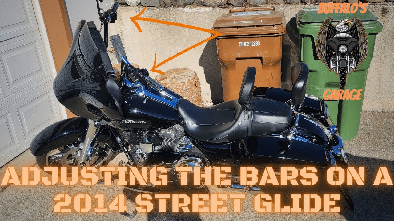 Handlebar adjustment on a 2014 Street Glide courtesy of an asphalt crater