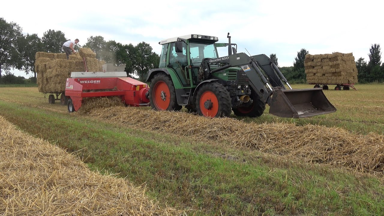 Kleine strobalen persen en laden met Fendt Farmer 309 en Lely Welger AP 630 (2021)