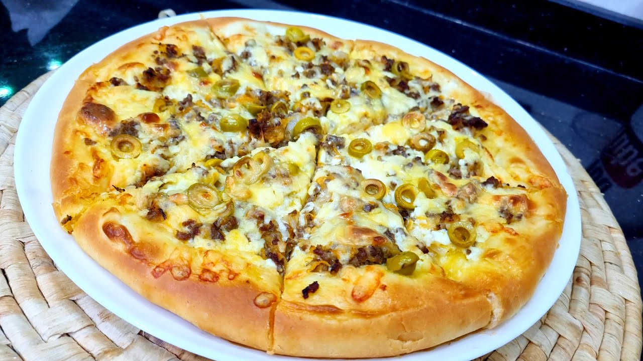 مطبخ ام وليد / بيتزا خفيفة و بنينة كيما اللي تتباع ، في الوصفة كل طرق نجاح الوصفة 👌😋.