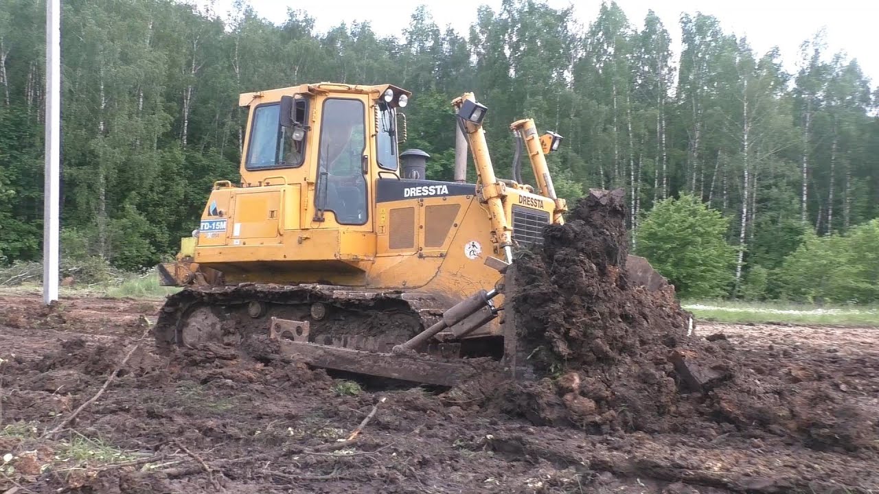 Dressta TD-15M stripping topsoil