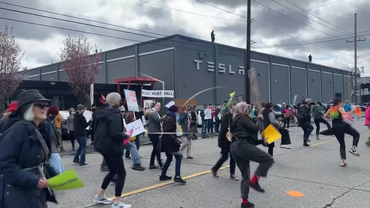 Protest outside Seattle-area Tesla building as part of worldwide movement