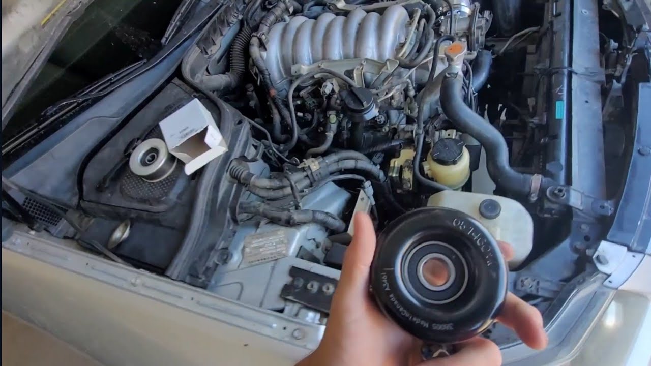 Replacing Tensioner Pulley On INFINITI M45 VK45DE