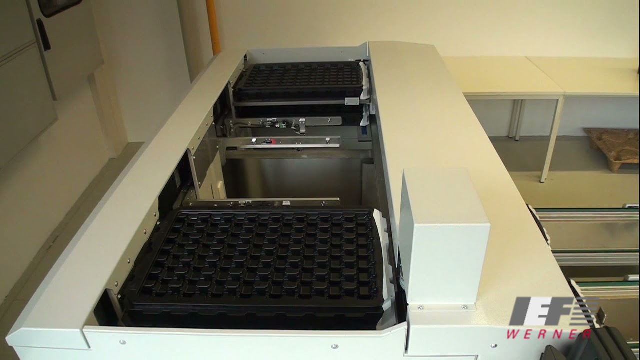 Component palletising systems 3 shaft varioSTACK tray handling with belt loading