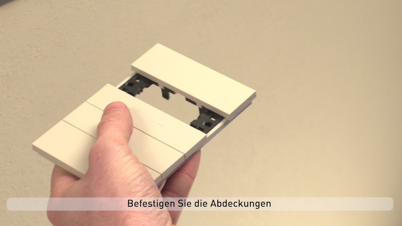 Schalterprogramm Living Now &ndash; Montage und Demontage des Abdeckrahmens und der Tastenabdeckungen