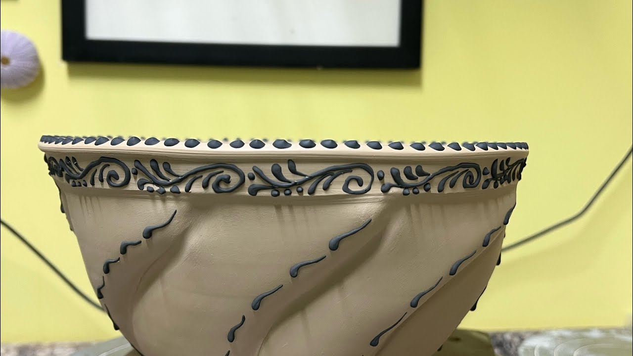 Wheel throwing and altering a pottery swirl bowl. January 21, 2026