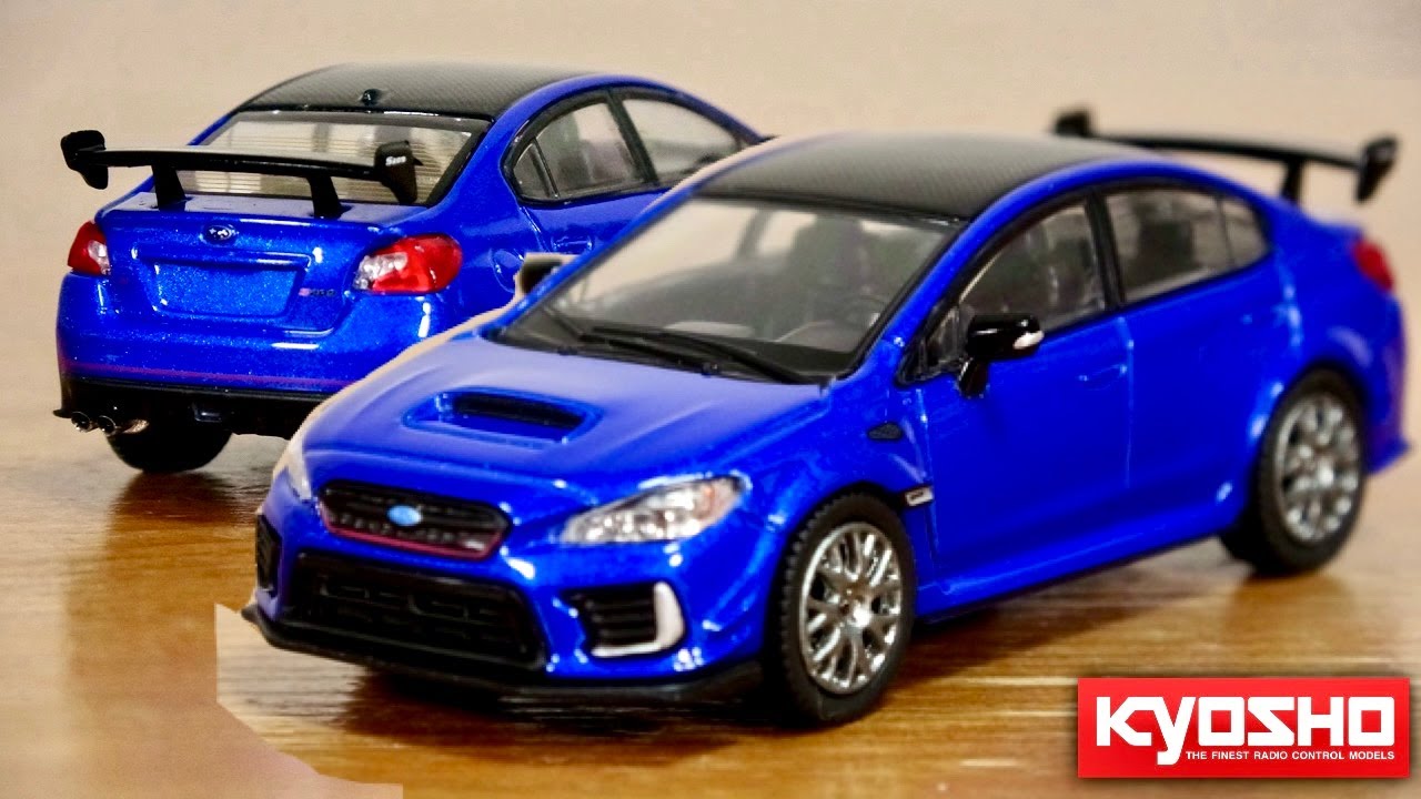 約半年ぶりの新作！ファミマ限定 京商ブック&ミニカー No.19 S209 ブルー WRX STiのエモーションを注ぎ込んだSシリーズ 繊細でカッコいい一台に仕上がってます☆KYOSHO
