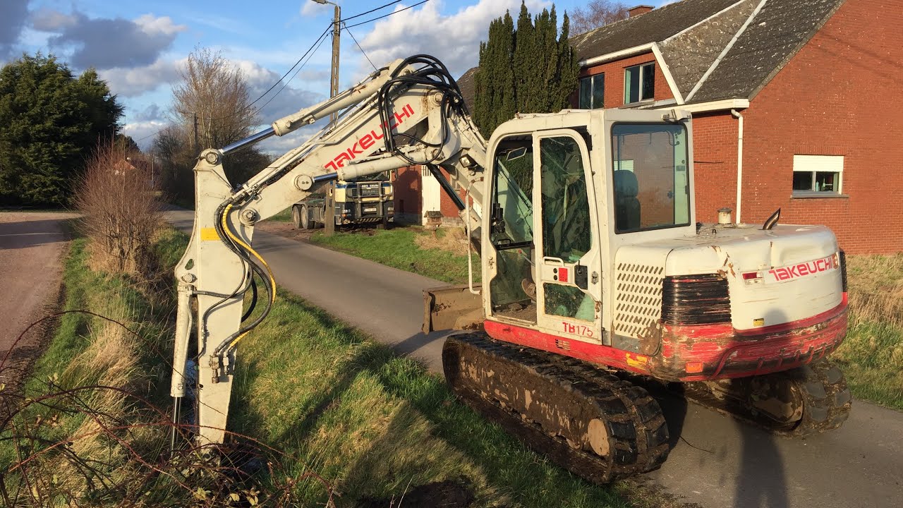 beken schoonmaken in schriek met audenaert met takeuchi TB 175