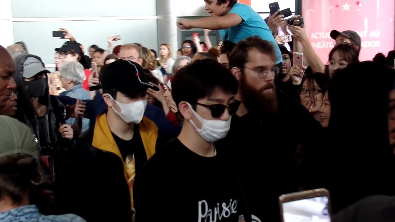 GOT7 (갓세븐) arriving at Paris airport in a crowd of crazy fans - 9th June 2018