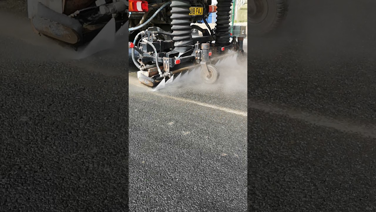 Kelly sweeper services.  Rear suction beam sweeper HS2