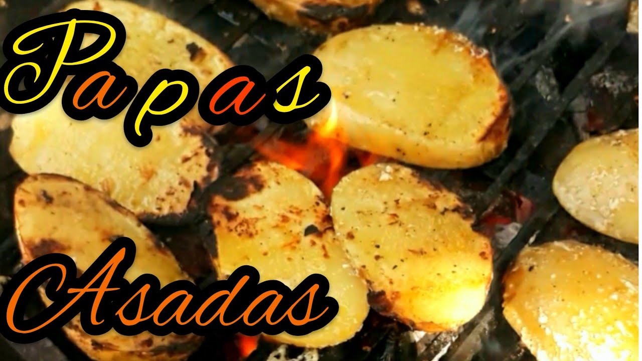 Papas Asadas a la Parrilla en Carb&oacute;n con mantequilla,ajo y pimienta.