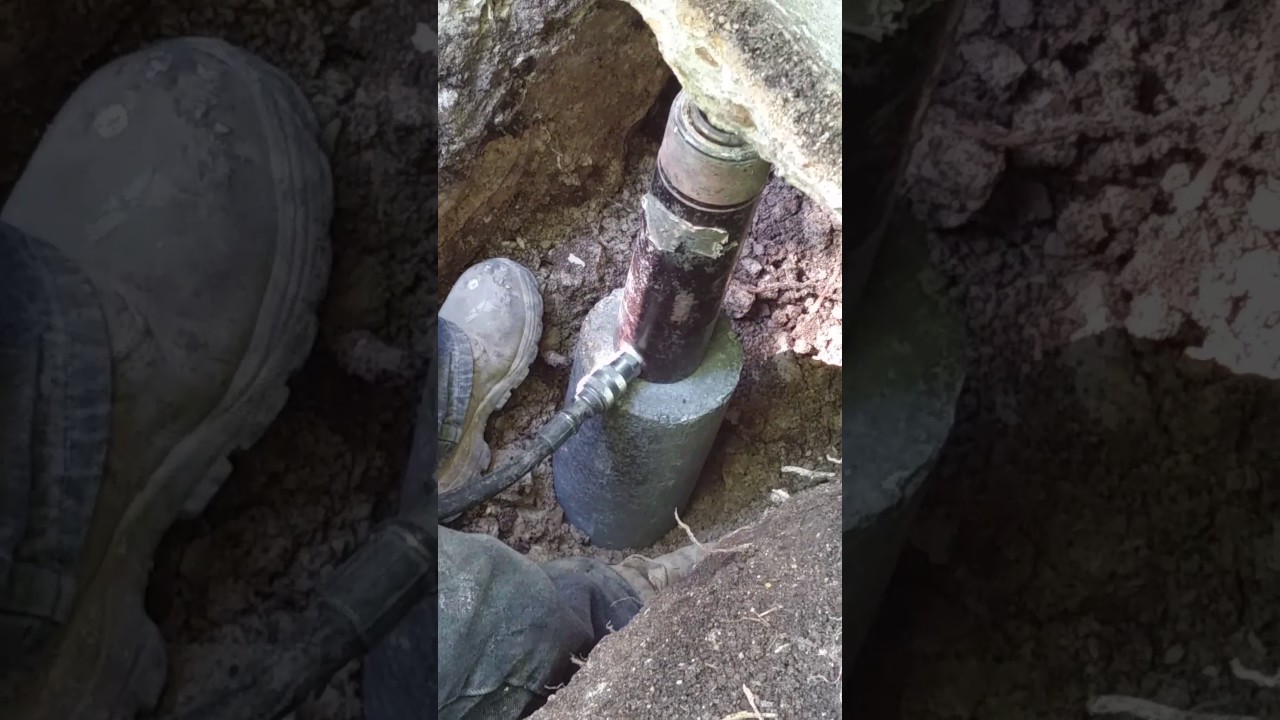 Instalando paipas de acero y cilindros de concreto para nivelar la fundacion