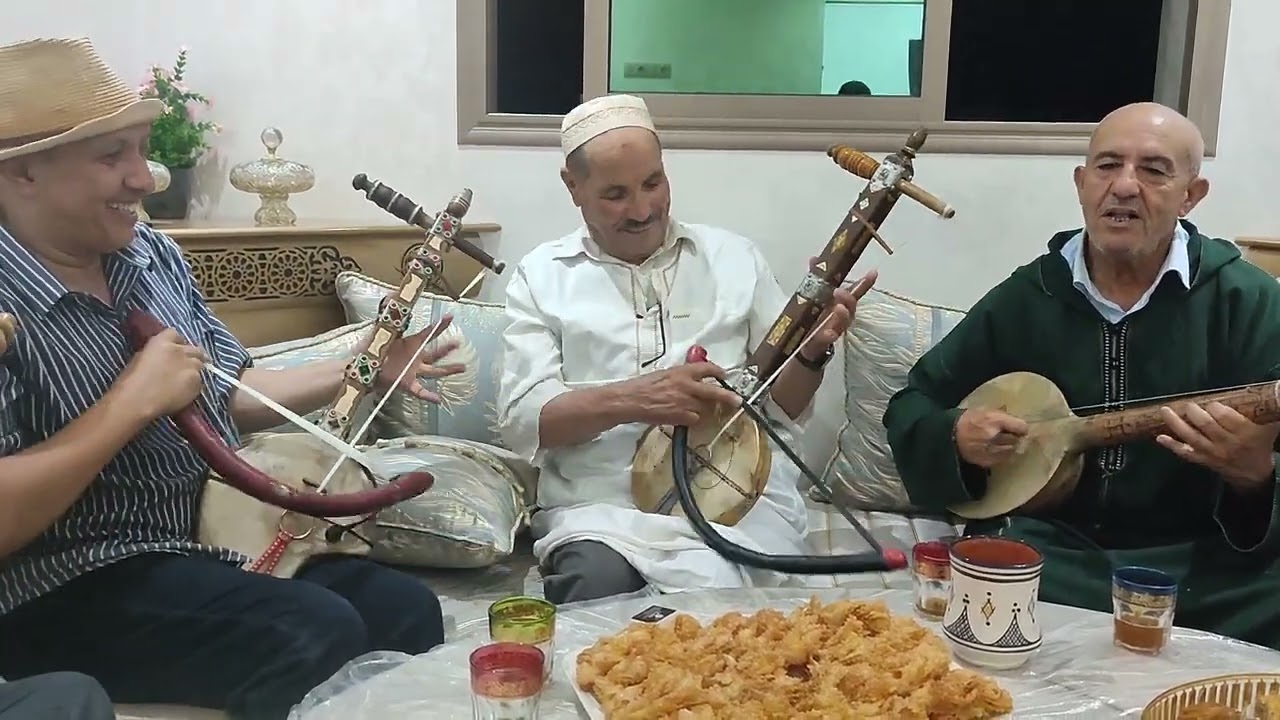 الرايس امبارك بقاس والفنان حسن الوردي ذ سعيدجليل والشاعر ادبناصر الشاعر احمد حنتجا الشاعر موح اولحاج