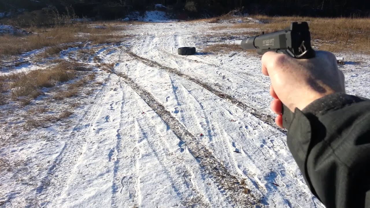 Colt Walther 1911 in .22 with a Gemtech Outback II