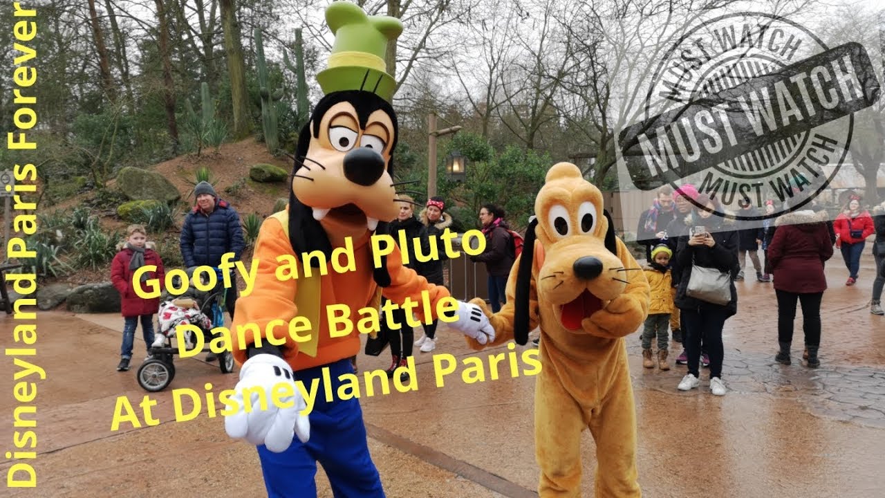 Goofy and pluto Dance battle at Disneyland Paris, adventureland