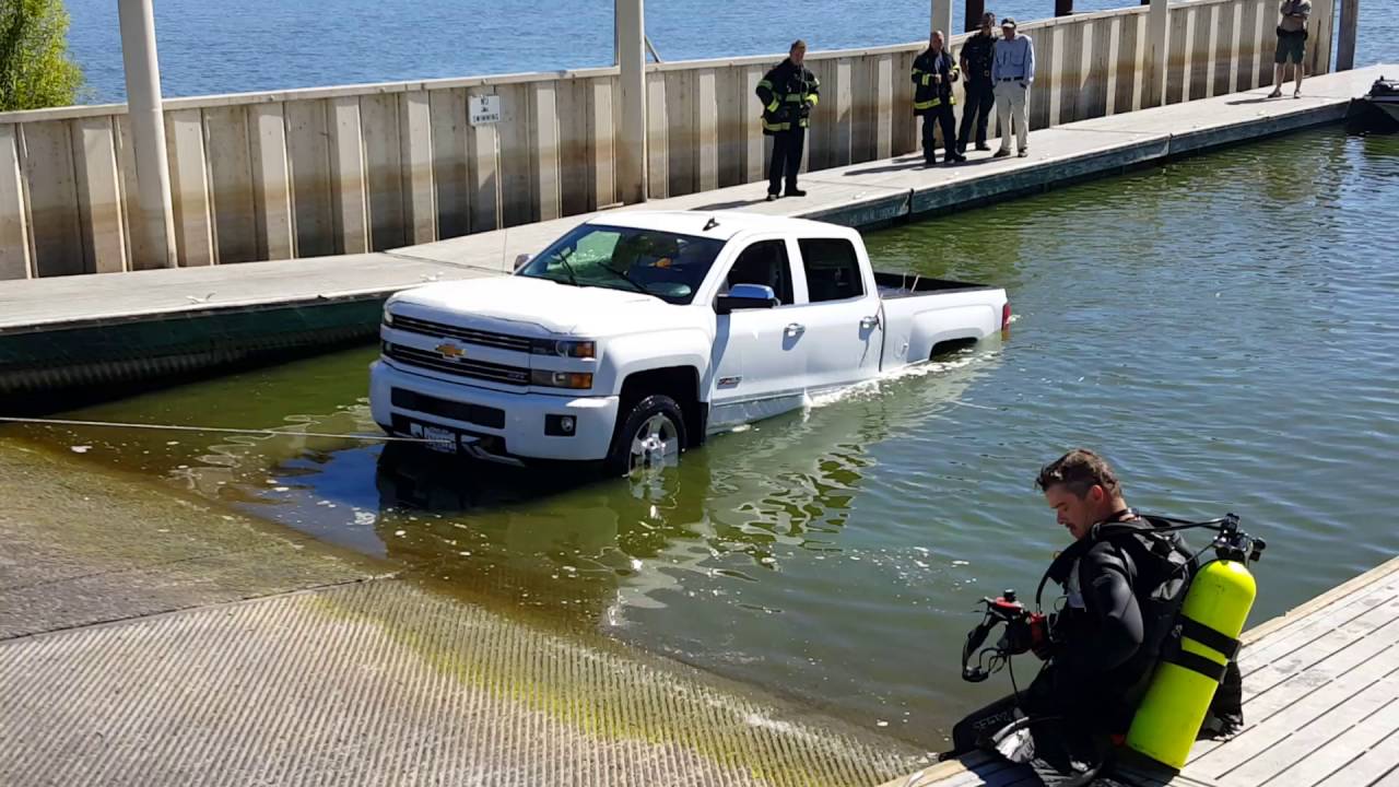 Brand new Silverado in water at, ramp total loss