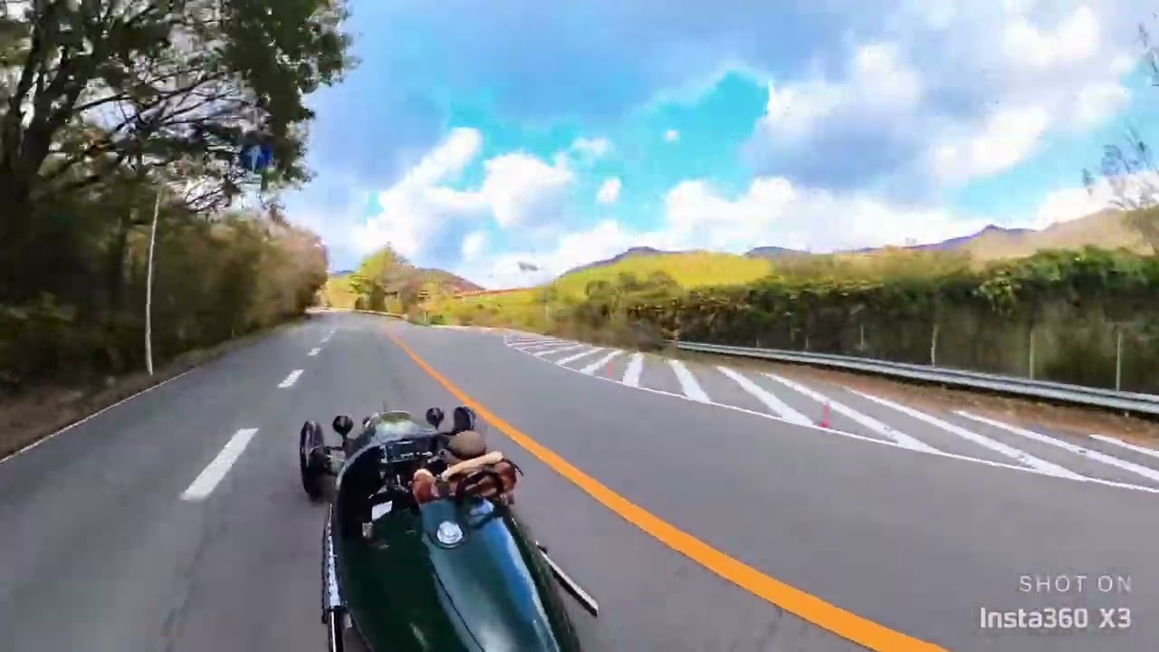 Morgan 3 wheeler and autumn mountains