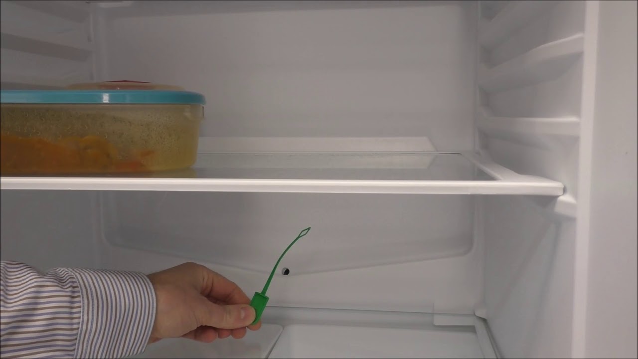 Water on shelf in fridge and smelly fridge?
