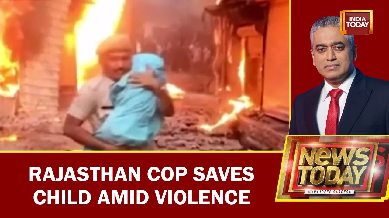 Rajasthan Cop Saves Child Amid Violence | Image Of The Day