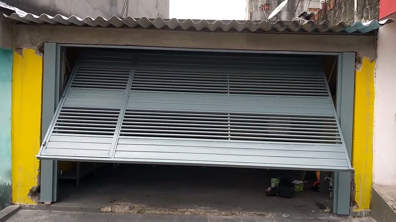 portão basculante automático  serralheria construart ligue agora para Dinho serralheiro 953976316