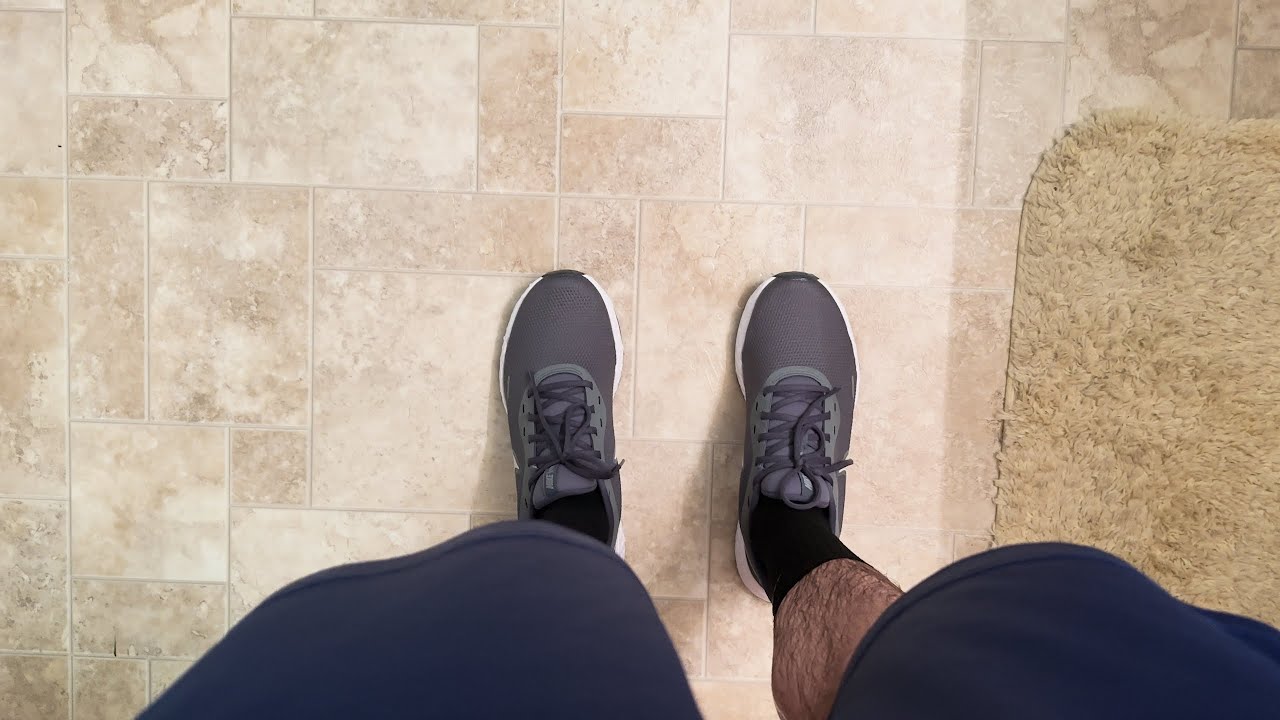 Wet Nike Revolution 5 Running Shoes in the Bath