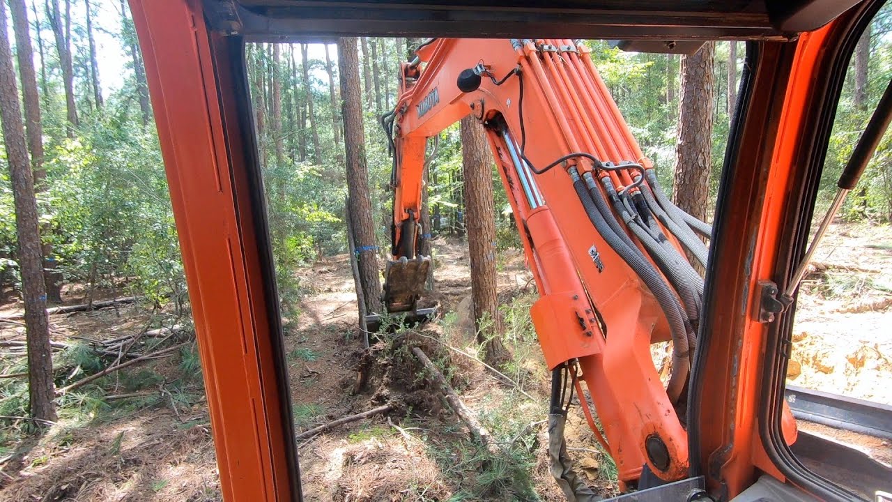 Clearing House Lot with Kubota KX080 and Husqvarna 550 XP