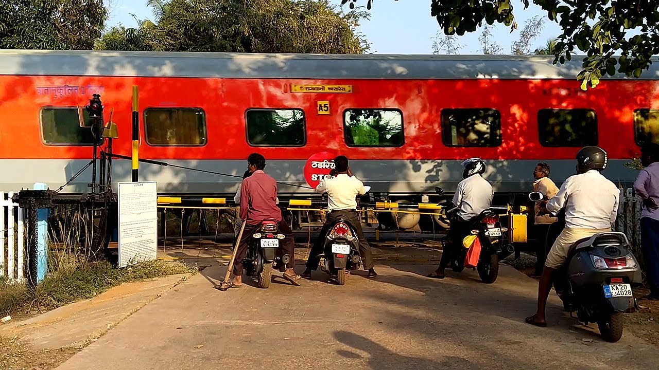 Rajdhani Express Thrashes a Railroad Level Crossing
