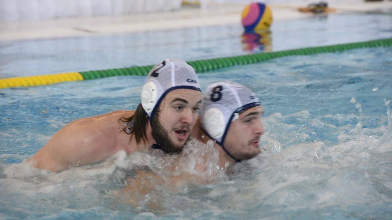 Pan Am water polo players on rough play below the surface