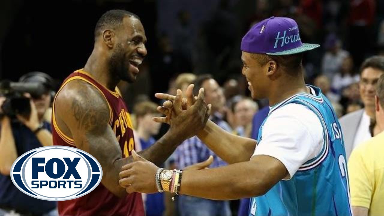 LeBron James and Cam Newton chat courtside | Cavs at Hornets