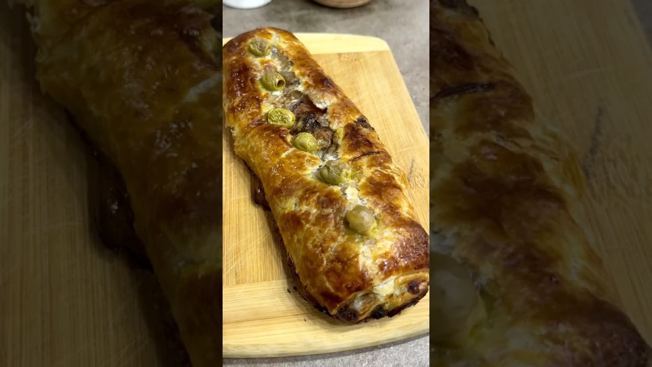 ROTOLO DI SFOGLIA CON MORTADELLA STRACCHINO E SALSA TARTUFATA