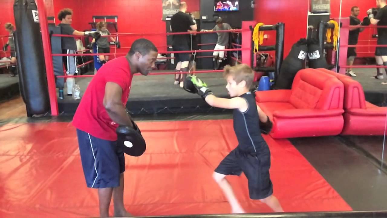 Sensei Peter Cunningham training 9 year old student Vincent 2014