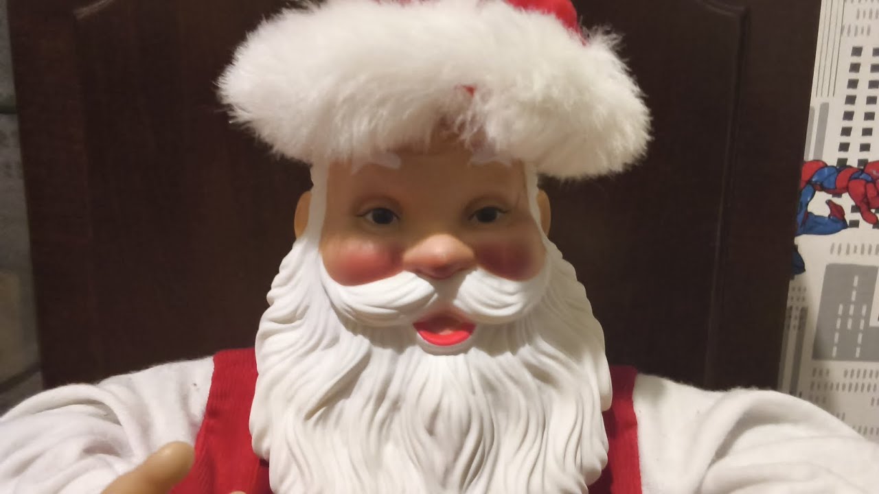 SIG 1999 RadioShack rockin Santa (issues) 