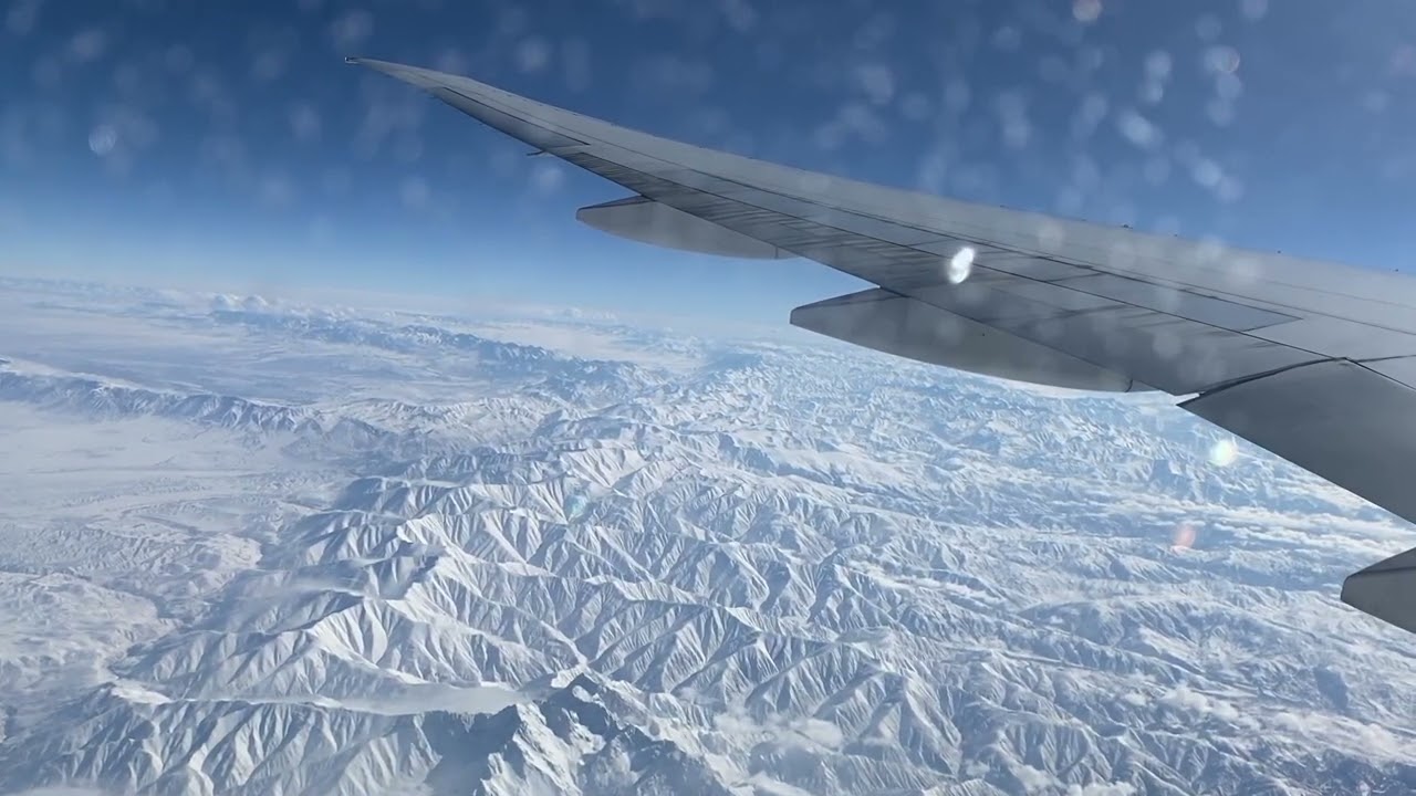 Himalayan mountains from a flight flying at 10972 meters altitude | Air India