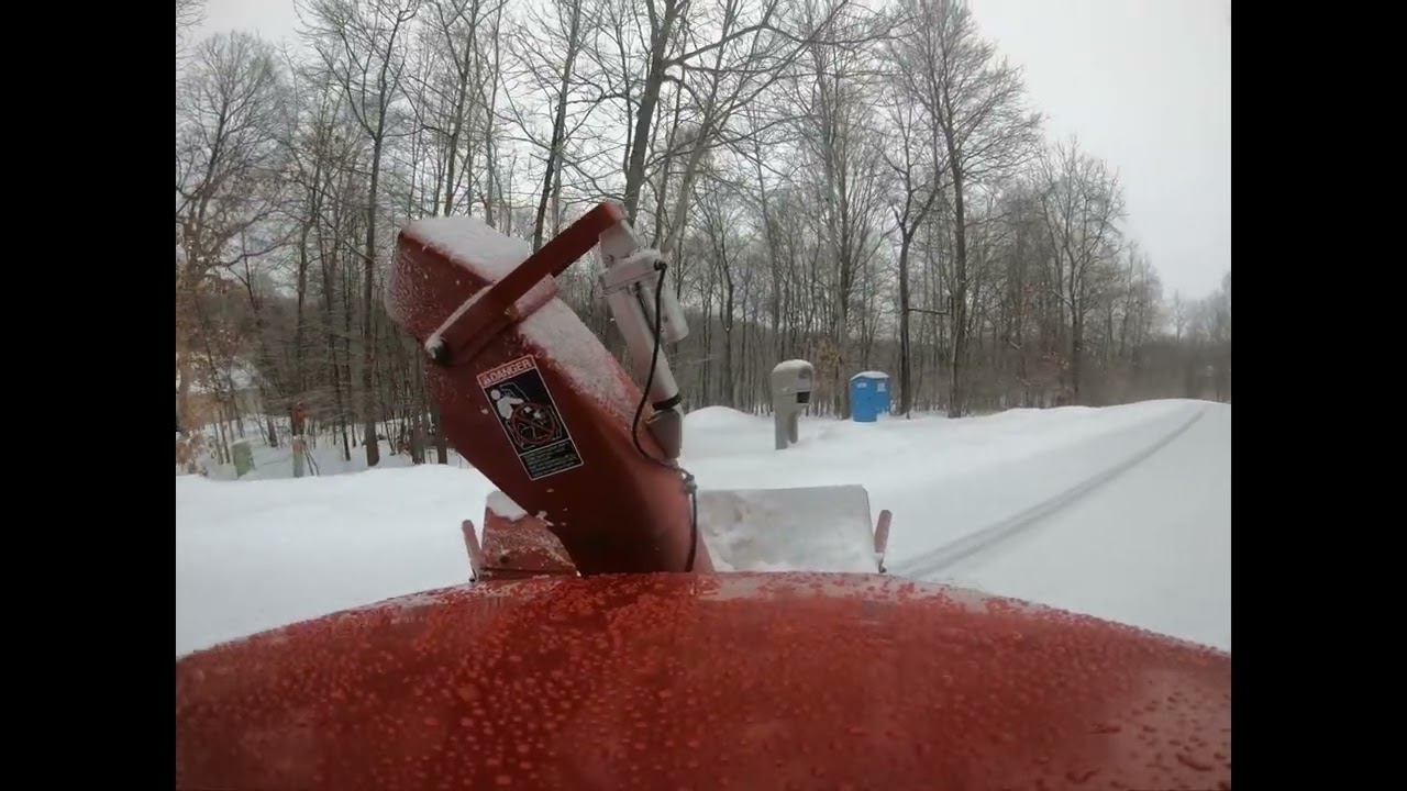 Wheel Horse 522xi and 520Lxi in action blowing and plowing snow in 2022.