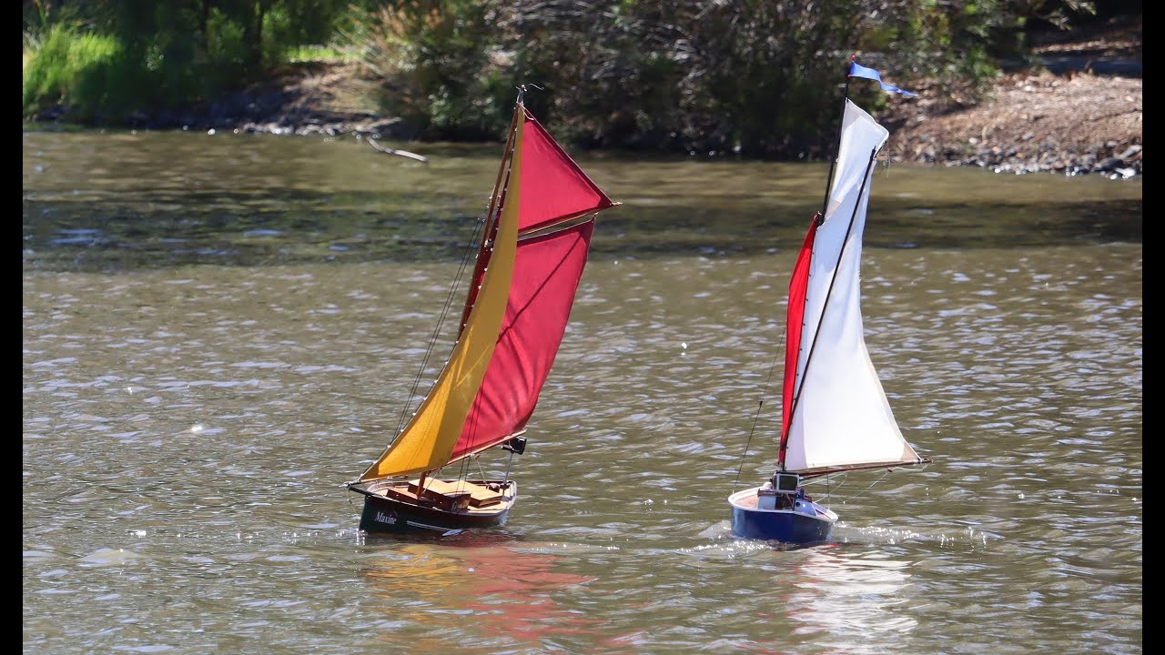 Two sloops and a friend