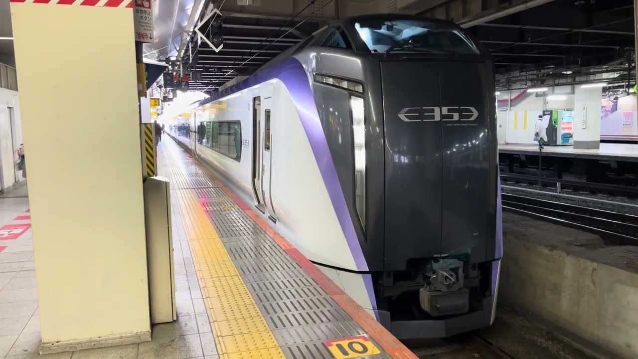 E353系S115編成が特急あずさ16号東京行きとして新宿駅7番線を発車するシーン (5016M) 2026.3.4.11:55