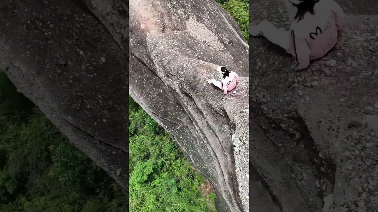 Insane Aerial Thrill: Woman's Heart-Stopping Cliff Descent Adventure!
