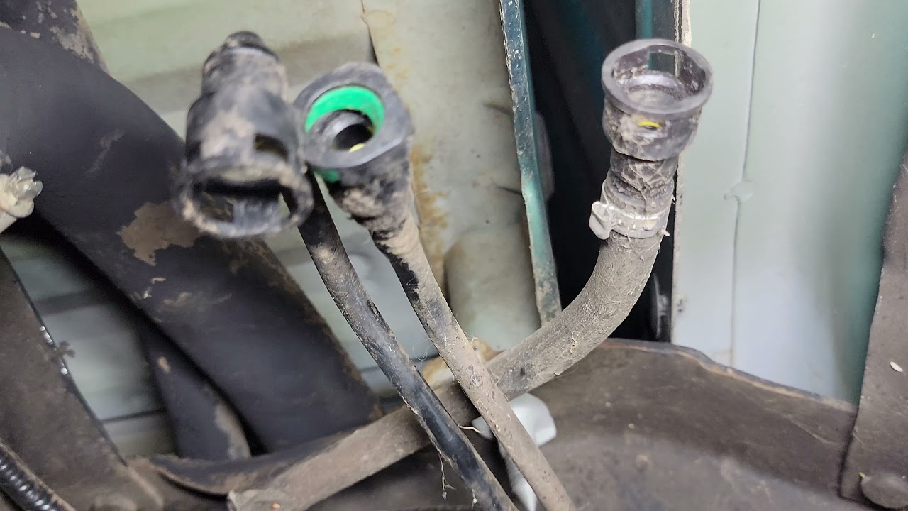 Jeep-Joe, 2000 Ford Ranger Fuel-pump replacement, at Wayne's Automotive. Wayne doing the work