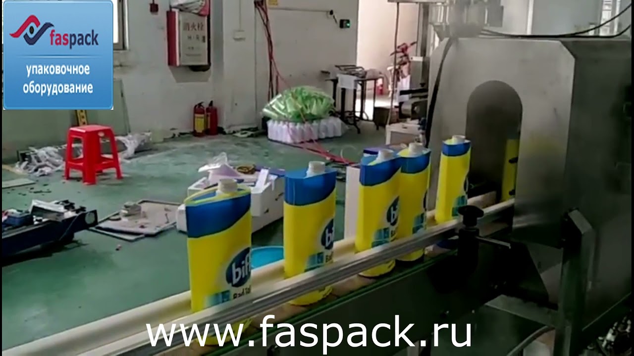 Термоусадочный этикетировщик с системой предварительной усадки пленки на дне