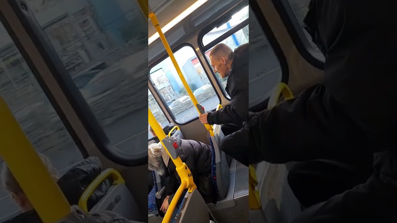 Adam and Paul talking with ghost in Dublin Bus