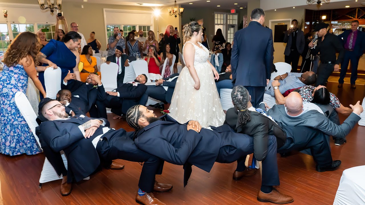 Chair Trick Game during a Wedding Reception at Wooden Sticks Golf Club in Uxbridge, Ontario, Canada