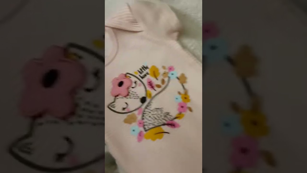 Baby onesie on a kitty. How to turn a onesie into a recovery suit for after surgery.