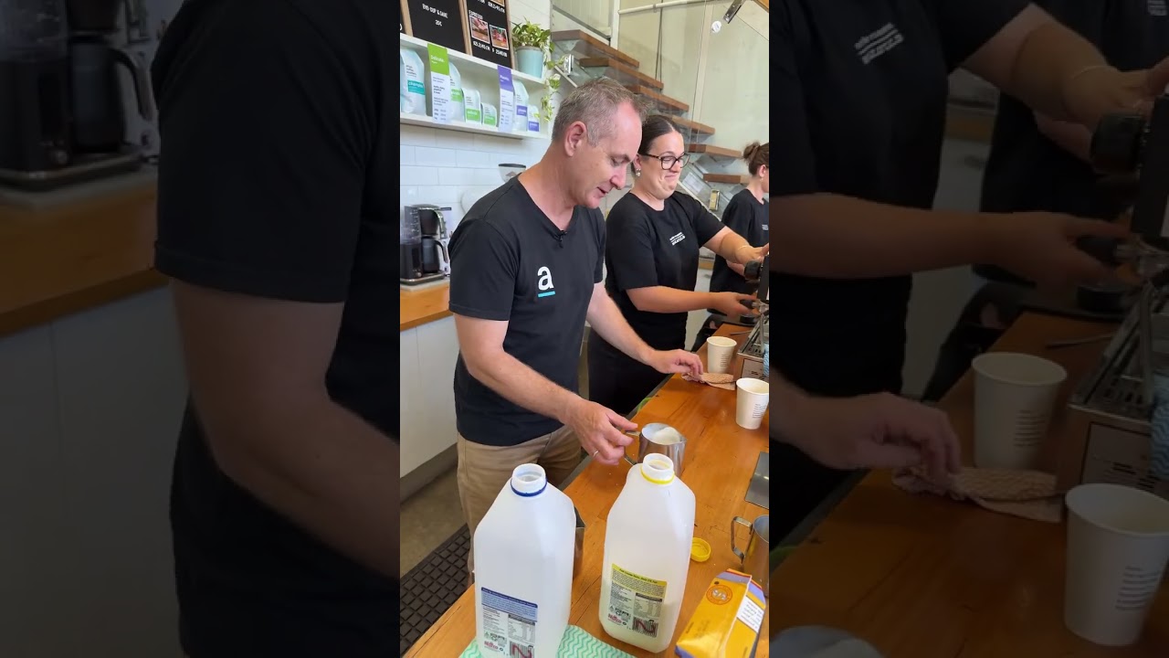 Luke Pouring a Takeaway Flatwhite During our YouTube Live