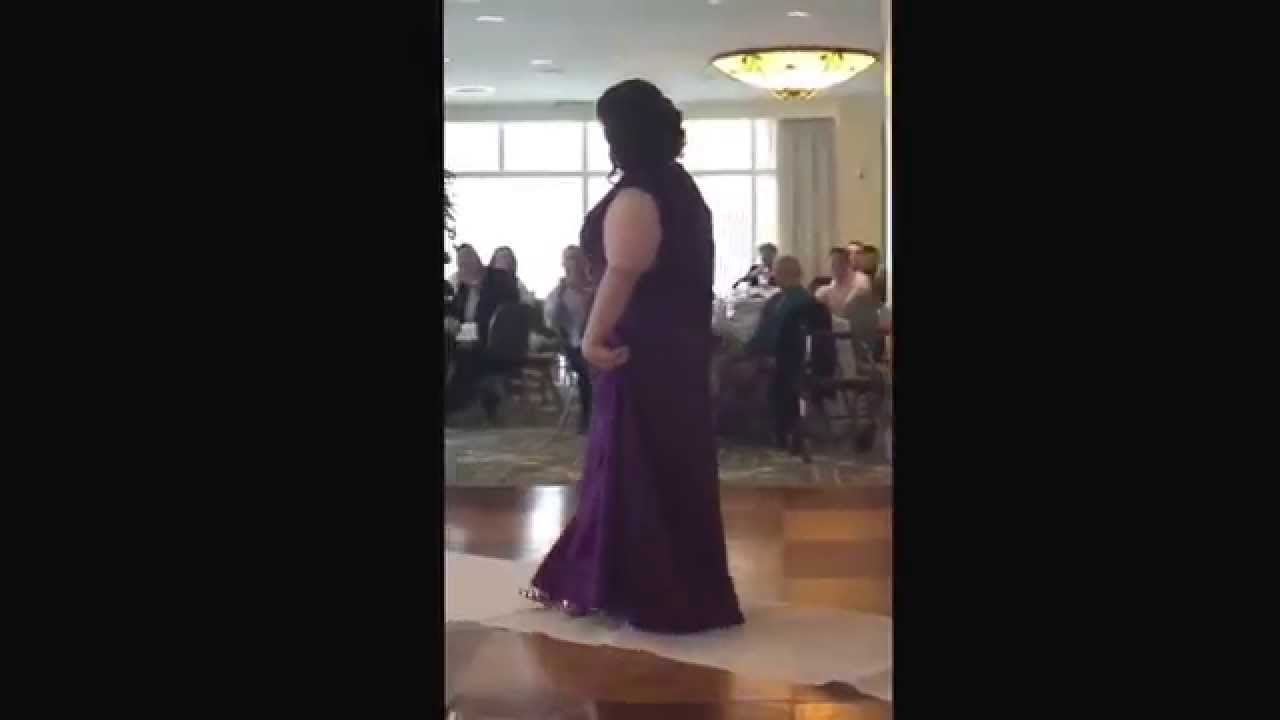 Bride sings down aisle to her bride