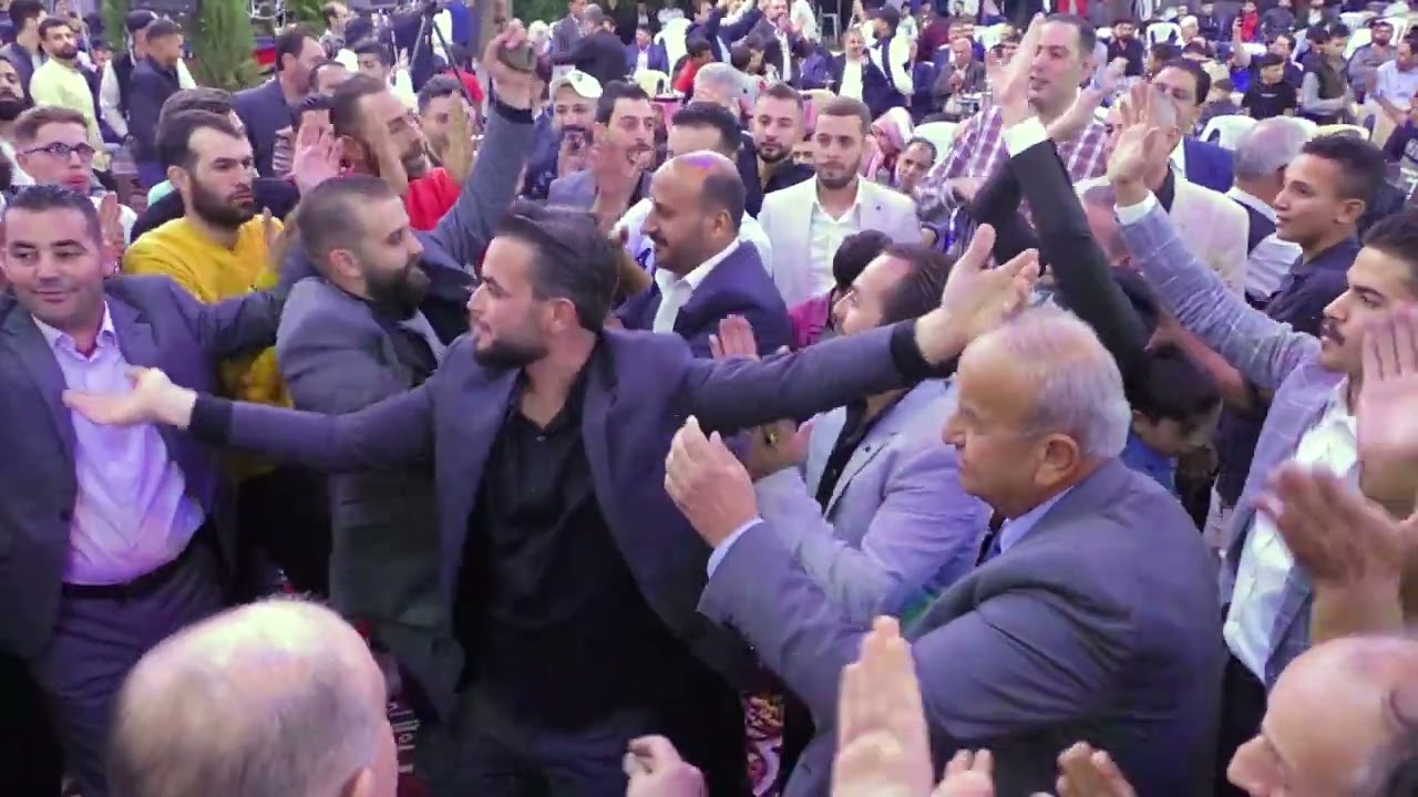 الشاعر زكريا يحيى والشاعر بشار الشربجي عرس المهندس منير علي بلان 7