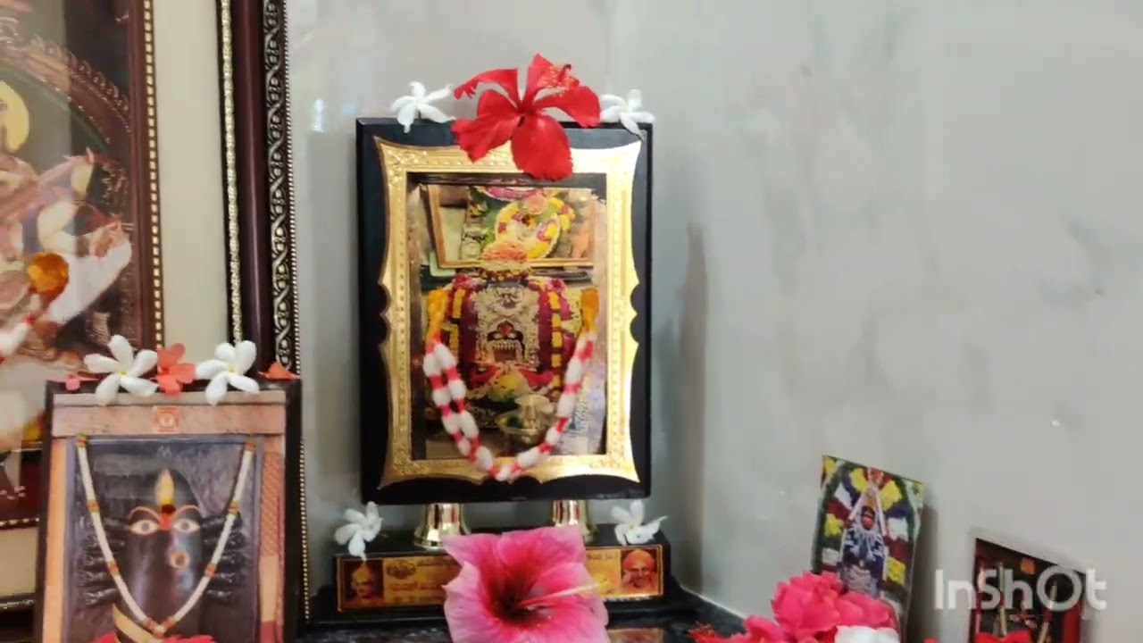Bhairavi ma and Adiyogi. South Indian Pooja room. Sacred diyas and hibiscus flowers.🪔
