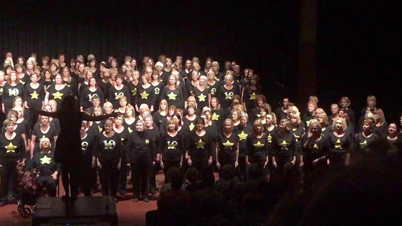 Rock Choir performing 'Something Inside So Strong' at Comberton Village College